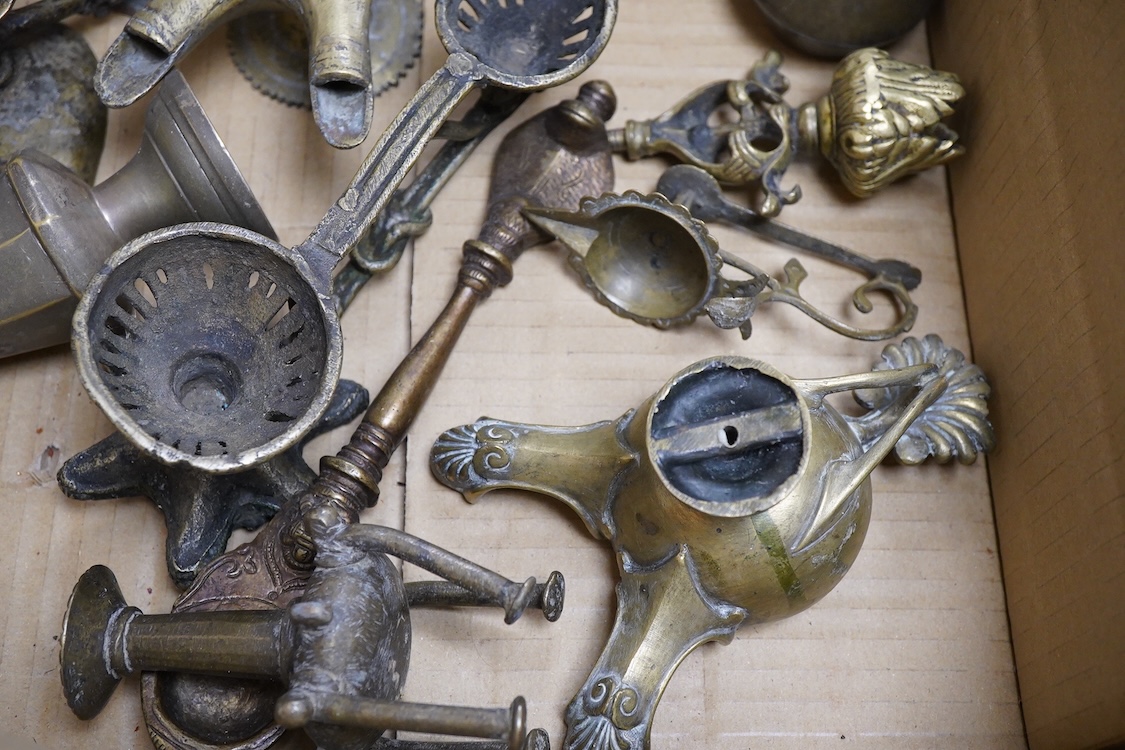 A group of small Middle Eastern mixed metalware lamps, burners etc